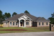 Black custom home by Acorn Construction in Navarre - Thumb Pic 1