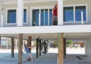 Moreland modern piling home on Navarre Beach by Acorn Fine Homes - Thumb Pic 15