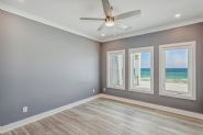 Modern coastal piling home in Navarre by Acorn Fine Homes - Thumb Pic 34