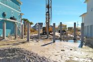 Modern coastal piling home on Navarre Beach by Acorn Fine Homes - Thumb Pic 8