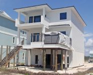 Davis modern coastal piling home on Navarre Beach by Acorn Fine Homes - Thumb Pic 4