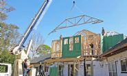 Seidel remodel in Pensacola by Acorn Fine Homes setting trusses - Thumb Pic 13