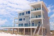 Modern coastal piling home in Navarre by Acorn Fine Homes - Thumb Pic 6
