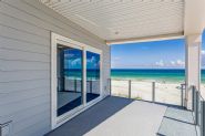 Modern coastal piling home in Navarre by Acorn Fine Homes - Thumb Pic 33