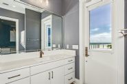 Modern coastal piling home in Navarre by Acorn Fine Homes - Thumb Pic 21