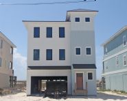 Davis modern coastal piling home on Navarre Beach by Acorn Fine Homes - Thumb Pic 1