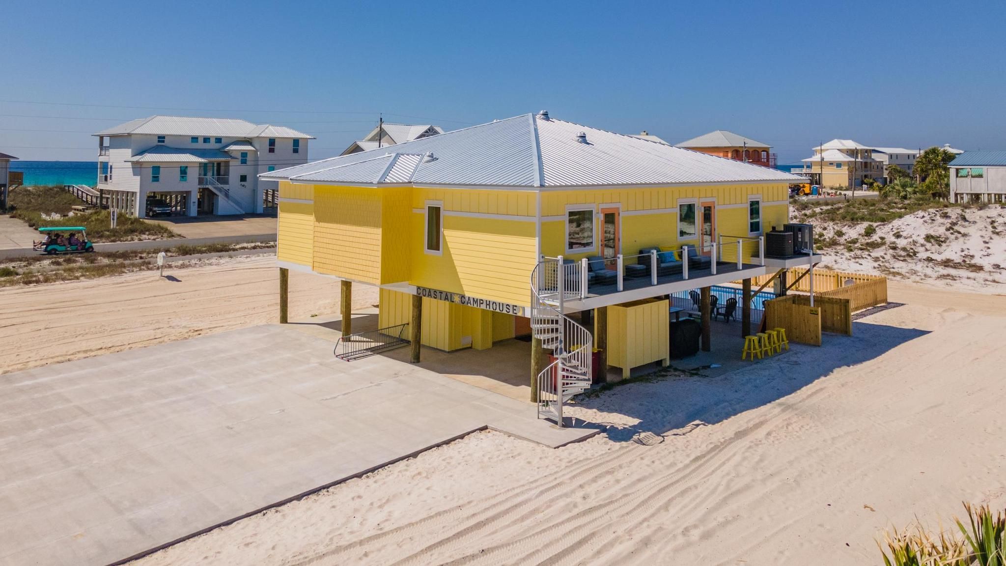 Gomel beach rental piling home on Navarre Beach by Acorn Fine Homes