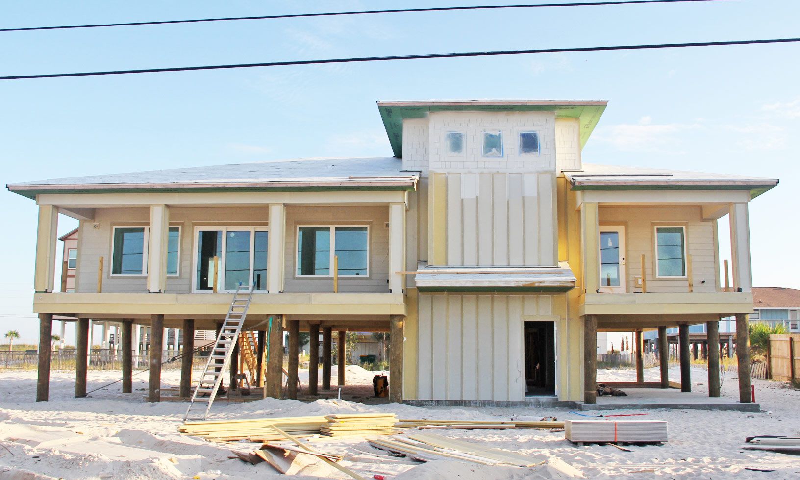 Moreland piling home on Navarre Beach by Acorn Fine Homes