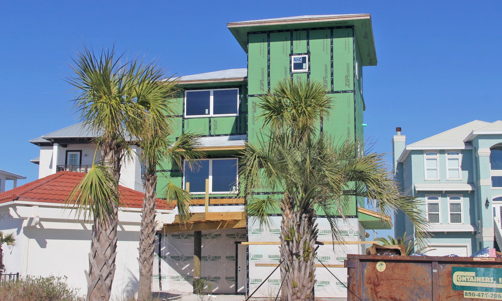 Slone piling home on Navarre Beach by Acorn Fine Homes