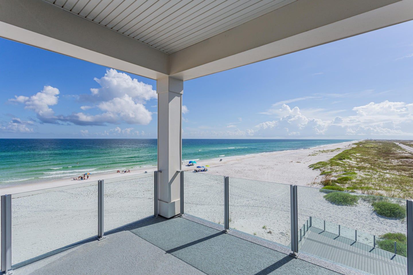 Modern coastal piling home in Navarre by Acorn Fine Homes