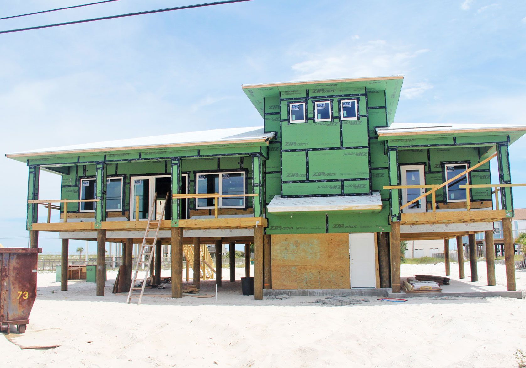 Moreland piling home on Navarre Beach by Acorn Fine Homes