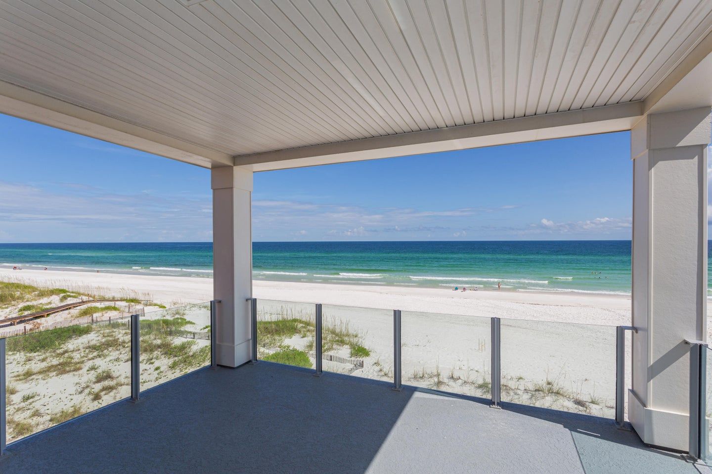 Modern coastal piling home in Navarre by Acorn Fine Homes