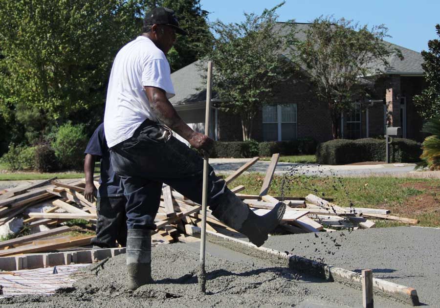 Acorn Construction pouring foundation for a custom home in Pensacola