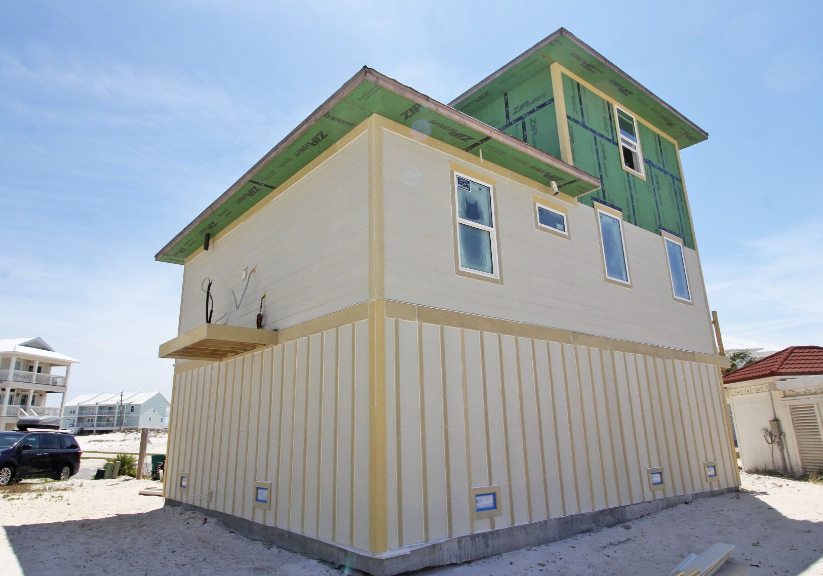Slone modern coastal piling home on Navarre Beach by Acorn Fine Homes