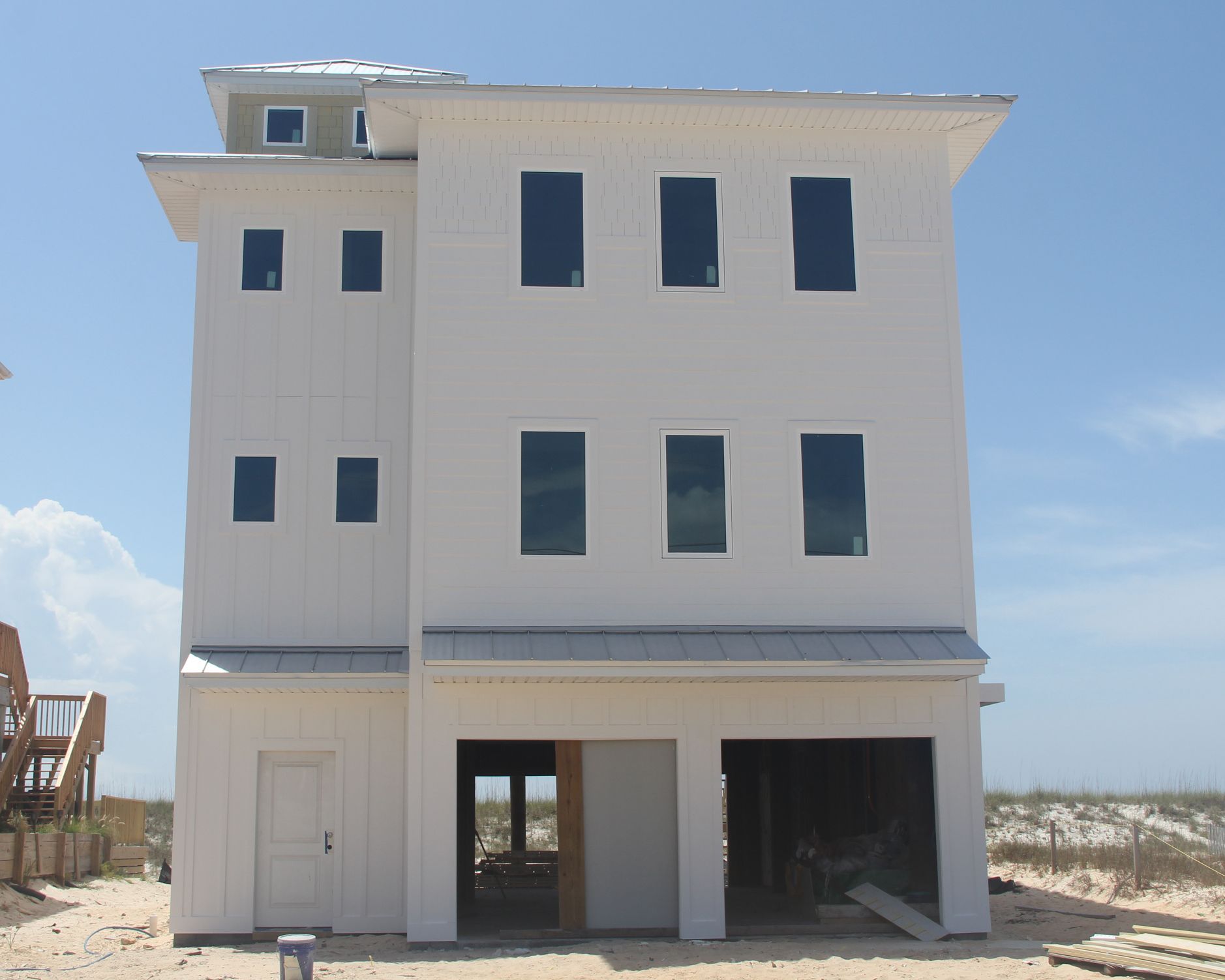 Smith coastal transitional style piling home on Navarre Beach