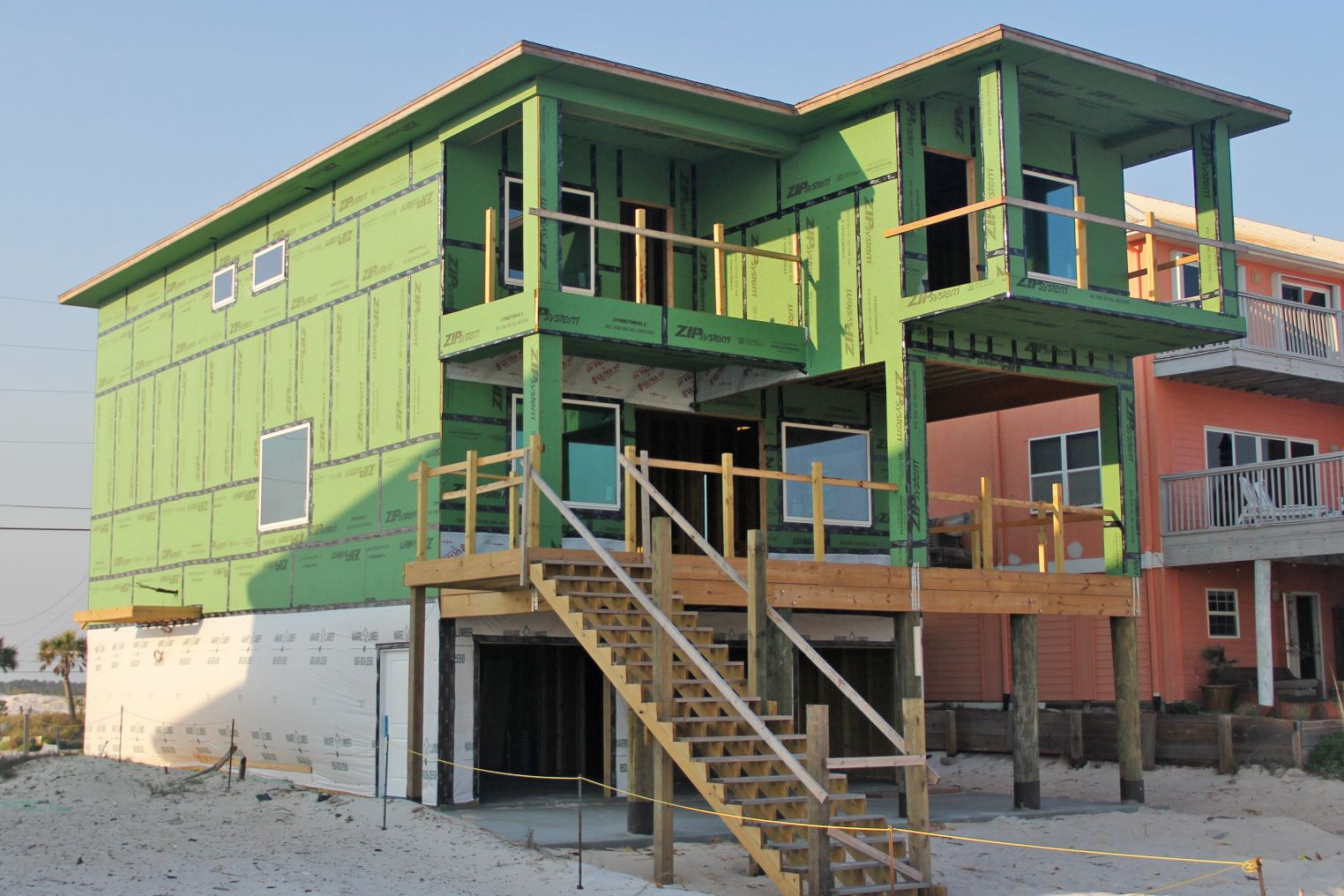 Smith coastal transitional style piling home on Navarre Beach
