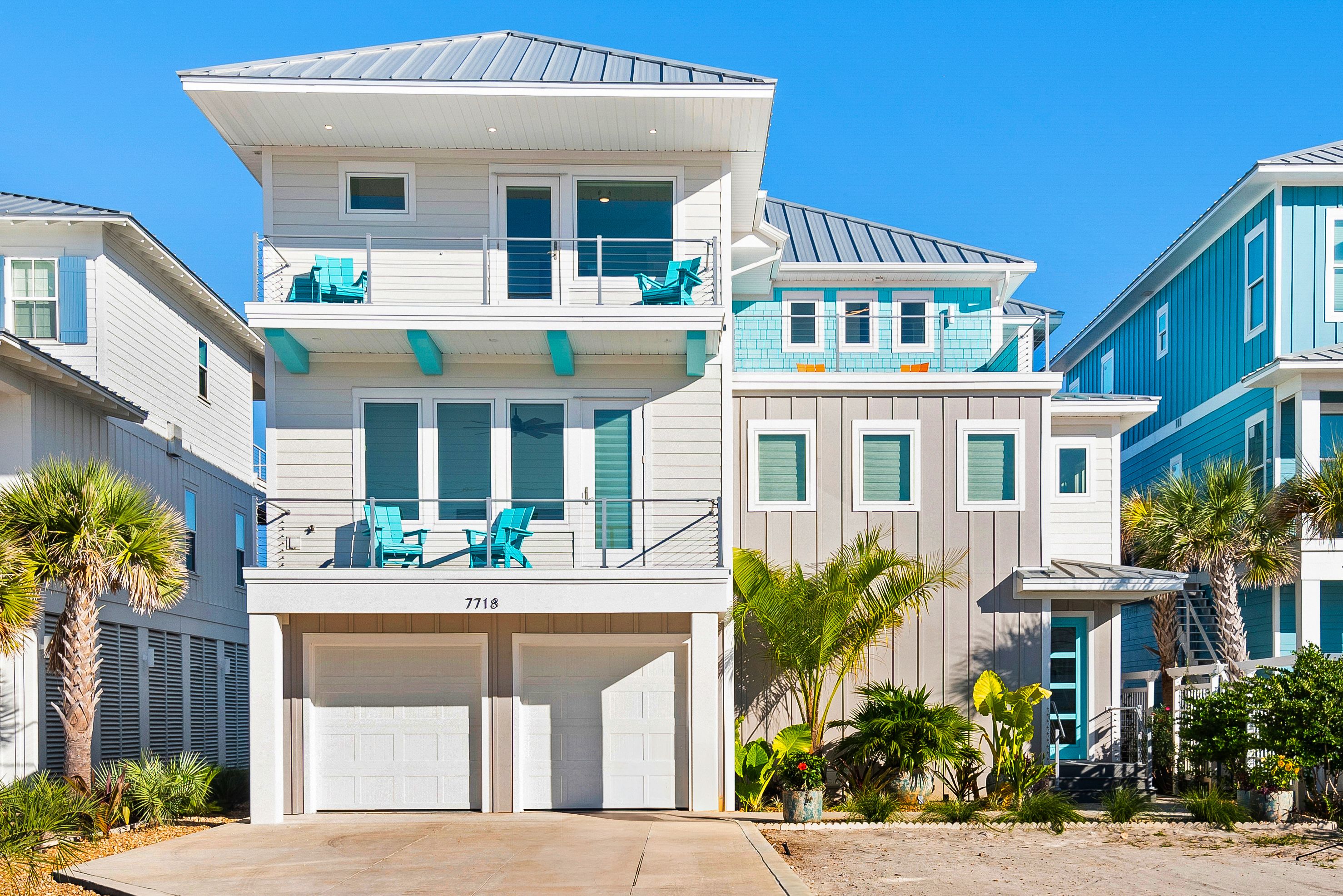 Modern coastal piling home in Navarre by Acorn Fine Homes