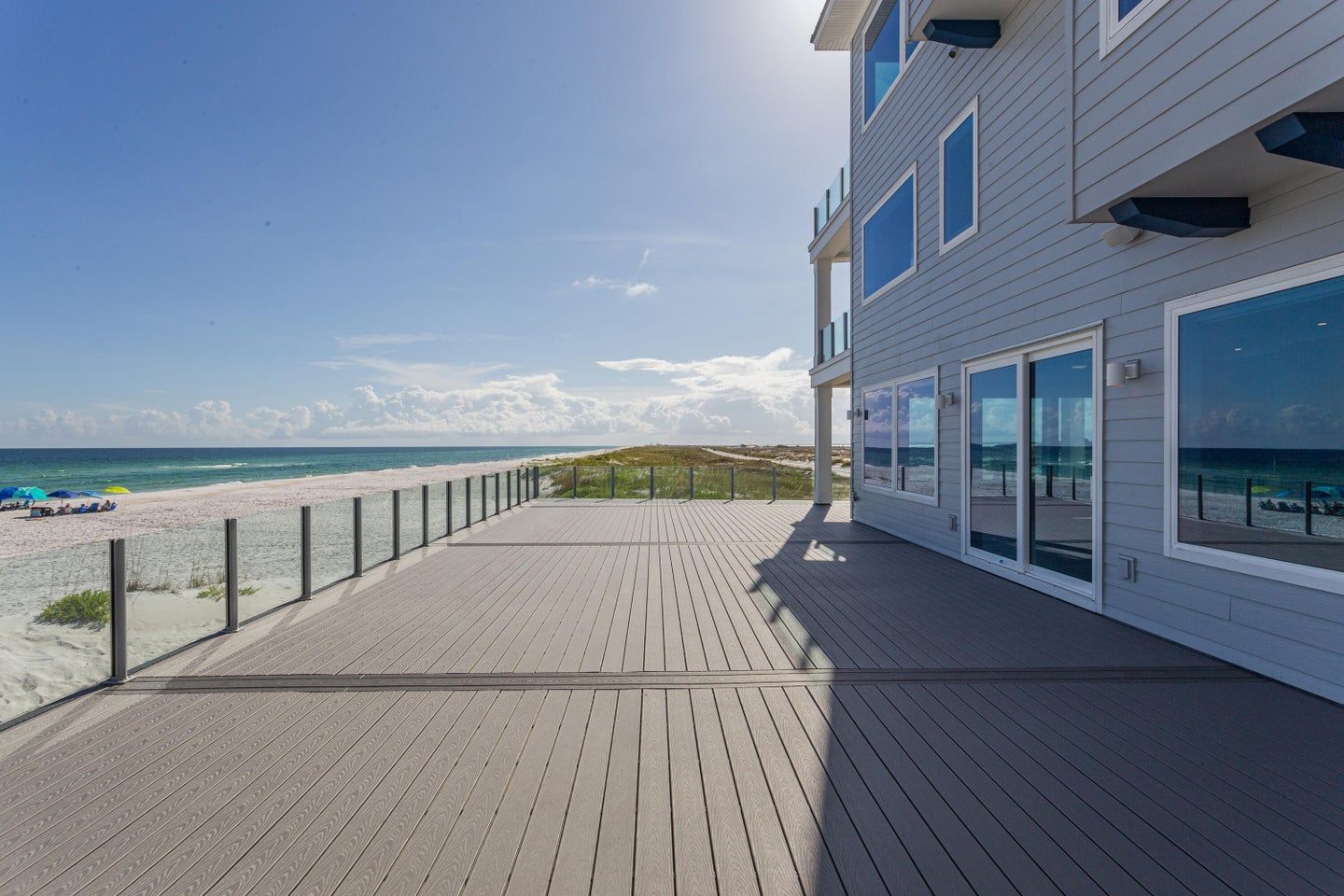 Modern coastal piling home in Navarre by Acorn Fine Homes