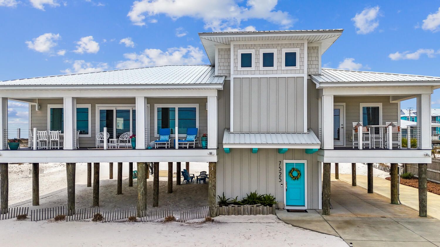 Moreland modern piling home on Navarre Beach by Acorn Fine Homes